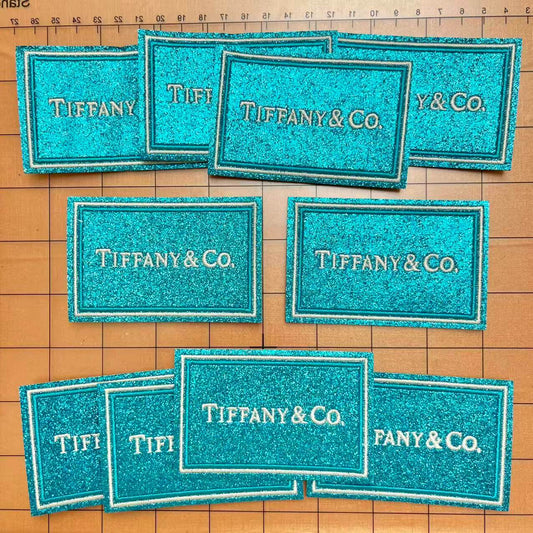 Iron-on patches- bling tiff' label*10 pcs